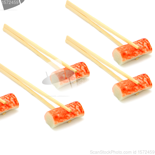 Image of sushi on chopstick