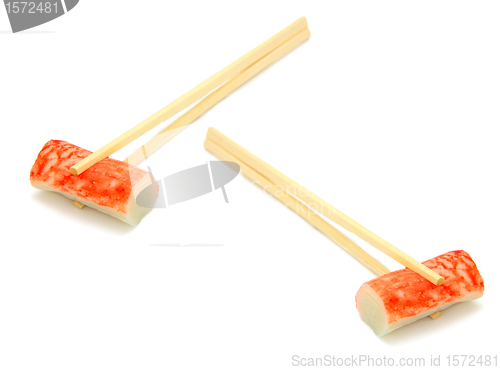 Image of sushi on chopstick