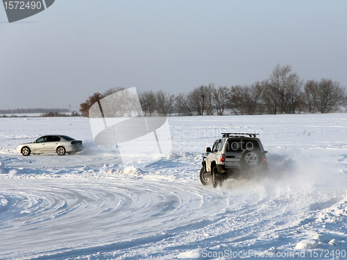 Image of Car on winter road.