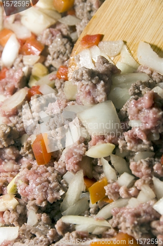 Image of ground beef with onions peppers for pasta sauce