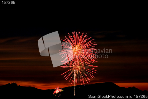 Image of Firecrackers In The Sky During Sunset