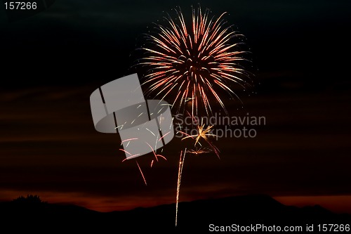 Image of Firecrackers In The Sky During Sunset