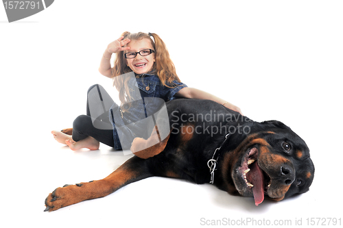 Image of rottweiler and child