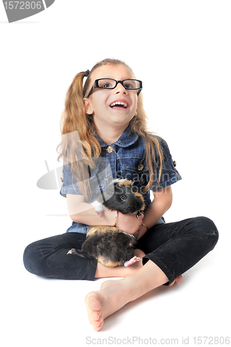 Image of child and Guinea pig