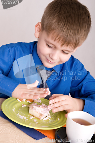 Image of child with cake
