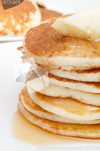 Image of Pancakes With Butter and Maple Syrup