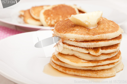 Image of Pancakes With Butter and Maple Syrup