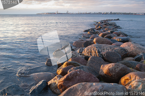 Image of Pier from stones on a sunset