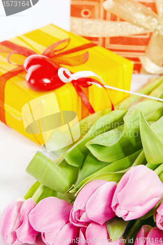 Image of Pink tulips and gift box, it is isolated on white