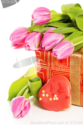 Image of Pink tulips and gift box, it is isolated on white