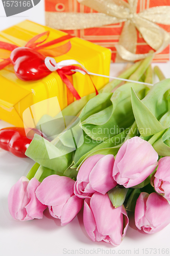 Image of Pink tulips and gift box, it is isolated on white