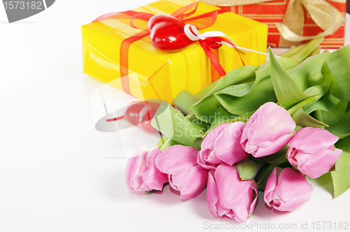 Image of Pink tulips and gift box, it is isolated on white
