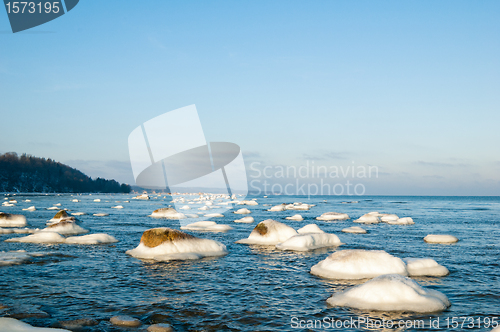 Image of  ice-covered stones along the shores of the Baltic Sea 