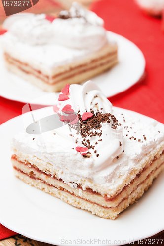 Image of Puff cake with whipped cream, a close up