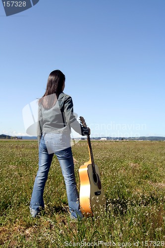 Image of Woman guitar player
