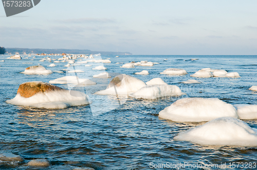 Image of  ice-covered stones along the shores of the Baltic Sea 