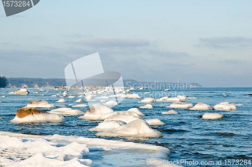 Image of  ice-covered stones along the shores of the Baltic Sea 