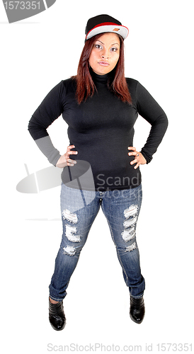 Image of Girl standing in jeans.