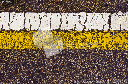 Image of Asphalt road mark macro backdrop white yellow line 