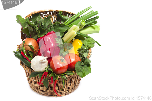 Image of Fresh vegetables in basket isolated on white