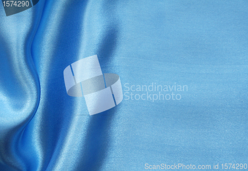 Image of Smooth elegant blue silk as background