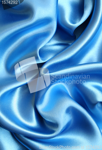 Image of Smooth elegant blue silk as background 