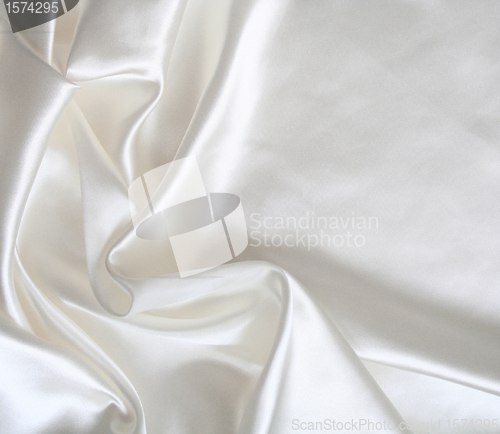 Image of Smooth elegant white silk as background 