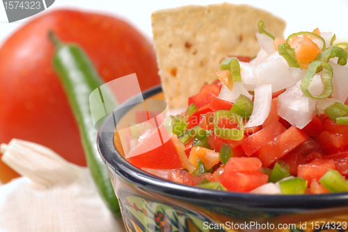 Image of Spicy salsa with variety of ingredients