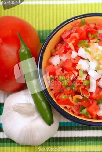 Image of Spicy salsa with variety of ingredients