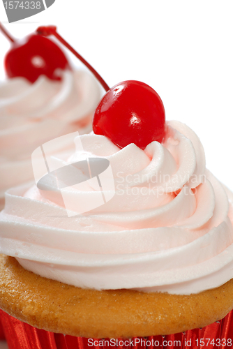 Image of Vanilla cupcake with maraschino frosting and cherry