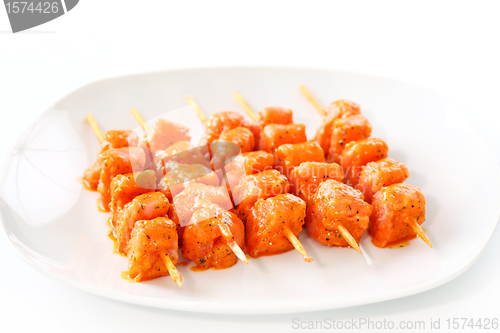 Image of Raw skewered marinated chicken 