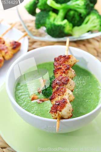 Image of Broccoli soup with skewered chicken
