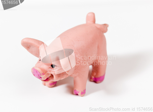 Image of Small wrinkled plastic pig in macro