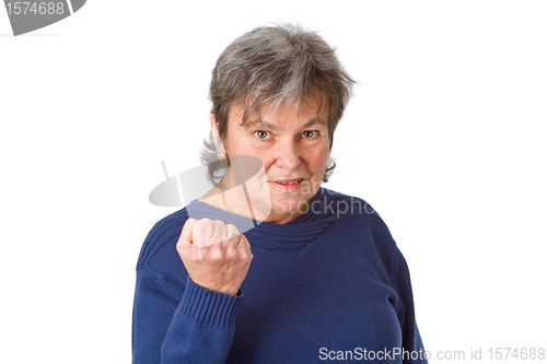 Image of Female senior with clenched fist