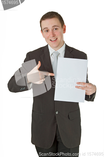 Image of Young businessman with white paper 