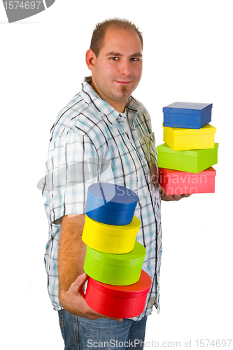 Image of Young man with gift boxes 