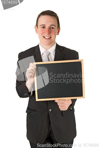 Image of Businessman holding a black board
