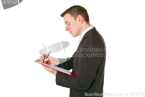 Image of Businessman writing on a clipboard