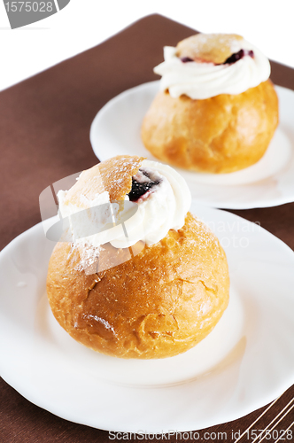 Image of Rich rolls with a cream, a close up