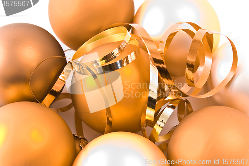 Image of christmas glass balls decorated with ribbons