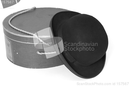 Image of Old derby hat with hat box in black & white