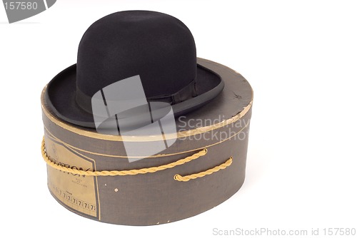 Image of Old derby hat resting on hatbox