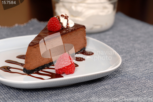 Image of Chocolate cheesecake with raspberries