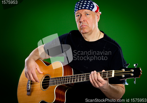 Image of man with a guitar