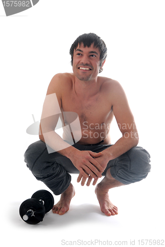 Image of man and dumbbells