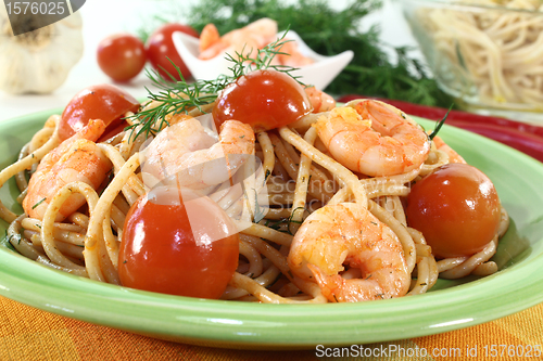 Image of cooked spaghetti with shrimp and dill