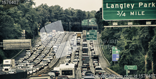 Image of Signs and Traffic on US Interstate