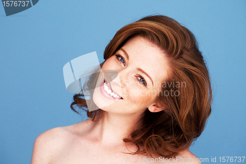 Image of Redhead Woman With Beautiful Smile