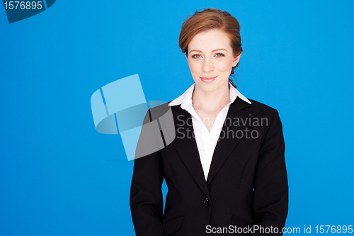 Image of Smiling Redhead Businesswoman