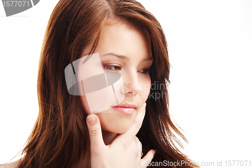 Image of Closeup portrait of a dreamy teenage girl